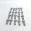 A collection of small, silver-colored quick solderless wire tap connectors arranged in a row.