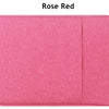 A bright rose red waterproof laptop sleeve with a handle for carrying notebooks.