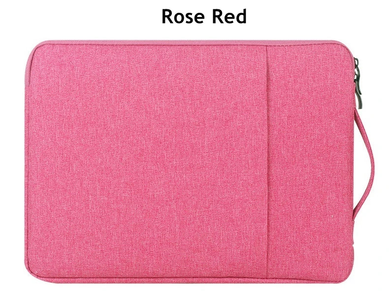 A bright rose red waterproof laptop sleeve with a handle for carrying notebooks.