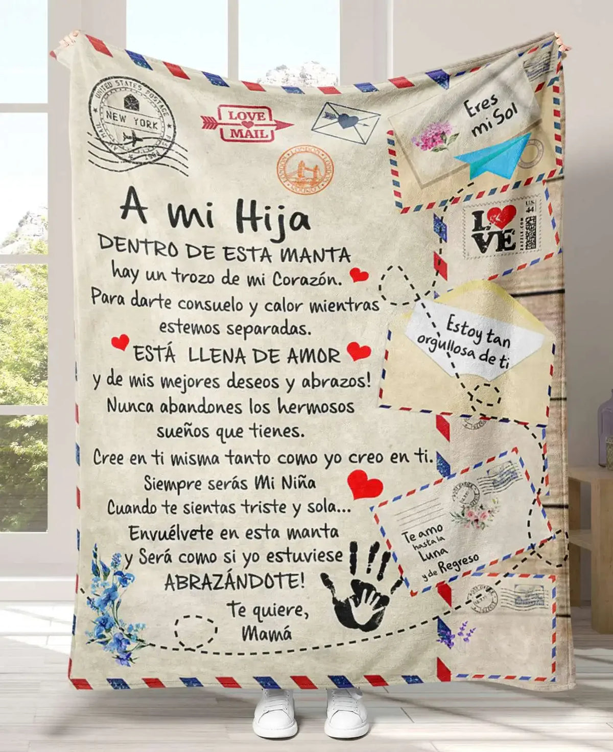 A personalized Spanish flannel throw blanket featuring a quote for a daughter, with embroidered hearts and text.