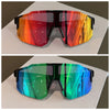 A pair of cycling sunglasses with a vibrant orange and red gradient lens set against a white background.