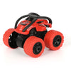 Red off-road stunt car with black chassis and large tires.