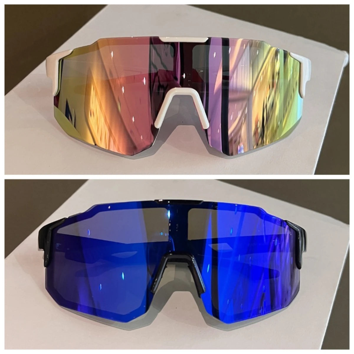A pair of polarized sunglasses showing a vibrant rainbow reflection on the lens, set against a white background.