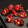 A collection of red resin polyhedral dice resting on a dark surface.