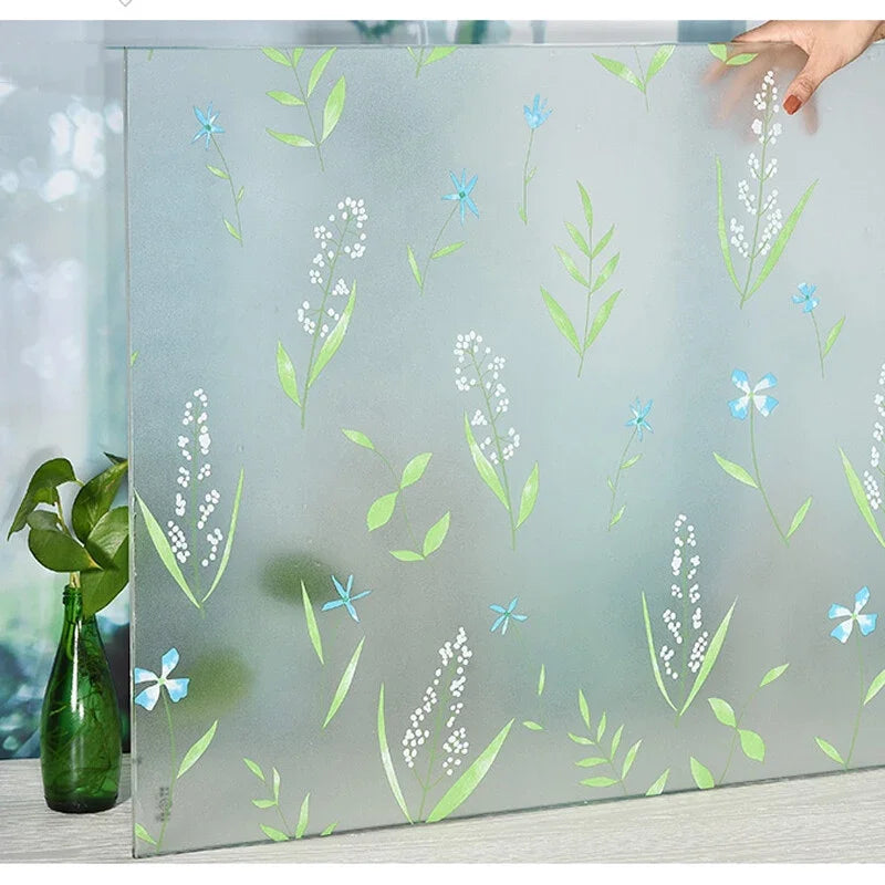 Frosted privacy window film with a delicate blue and white floral stripe pattern applied to glass.