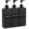 A three-pack of black refillable soap dispenser bottles with pump tops and labels for shampoo, body soap, and hand soap