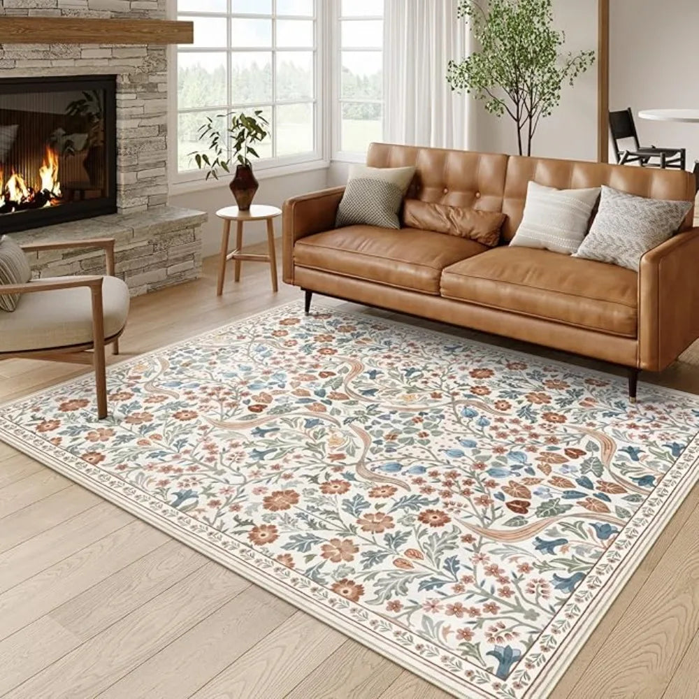 A rectangular floral vine pattern soft carpet mat placed on a light wood floor.