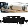 Black custom-fit dash cover for a Dodge Ram truck interior.