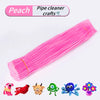 A pink pipe cleaner craft set featuring various small animal figures like a pink rabbit, red bird, yellow bear, green lizard,