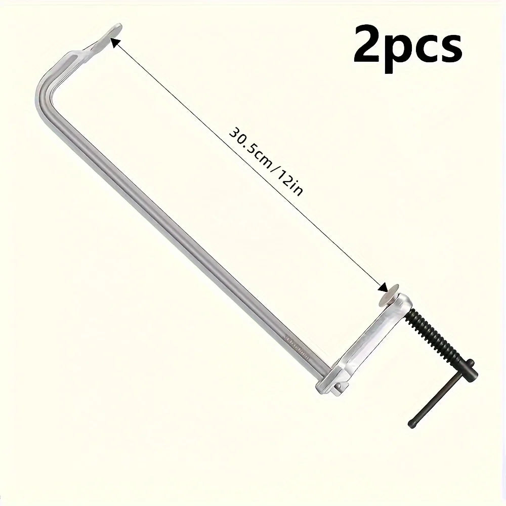 Zwei leichte gebogene Stahlstangenzwingen mit einer Messung von 30,5 cm oder 12 Zoll.