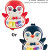 A set of two color random musical animal piano toys for toddlers, one red and one blue.
