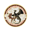 A round enamel pin featuring a black dragon silhouette against white clouds, set in a gold-rimmed circular design.