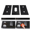 A set of three black reusable heat-resistant gas stove protector mats shown alongside a stovetop.
