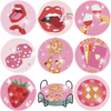 A set of DIY diamond art coasters featuring various designs like lips, strawberries, and playing cards with a metal stand.