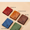 A collection of five leather bifold wallets in various colors including flame red, yellowish brown, coffee, blue, and tea gre