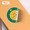 A round green sticker with a yellow border and text saying Your Logo Here is shown on an orange background.