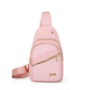 A pink quilted crossbody sling bag with a zipper and strap is shown against a white background.