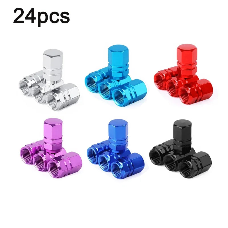 A set of four aluminum alloy wheel tire valve caps in various colors including silver, blue, red, and black.