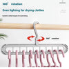 Three sets of 9-hole folding hangers for organizing clothes