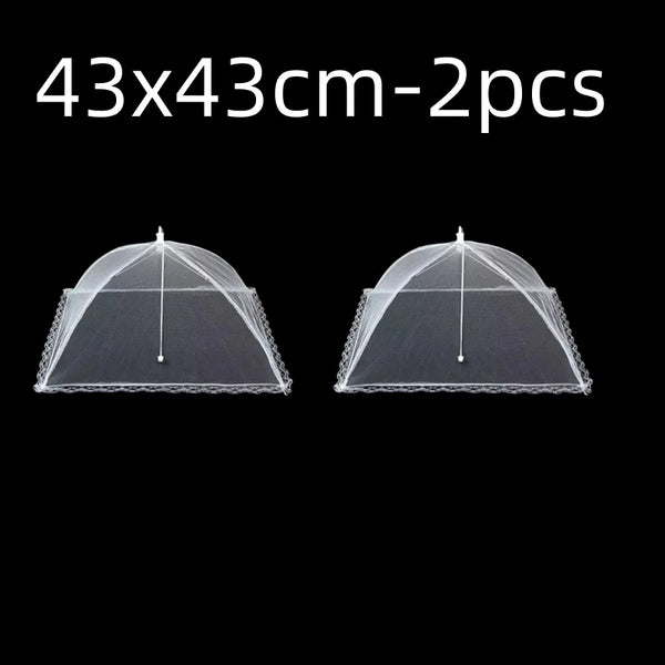 Two clear mesh food covers with pop-up design shown against a black background.