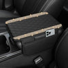 A black diamond quilted car armrest cover with storage featuring sparkling lights.