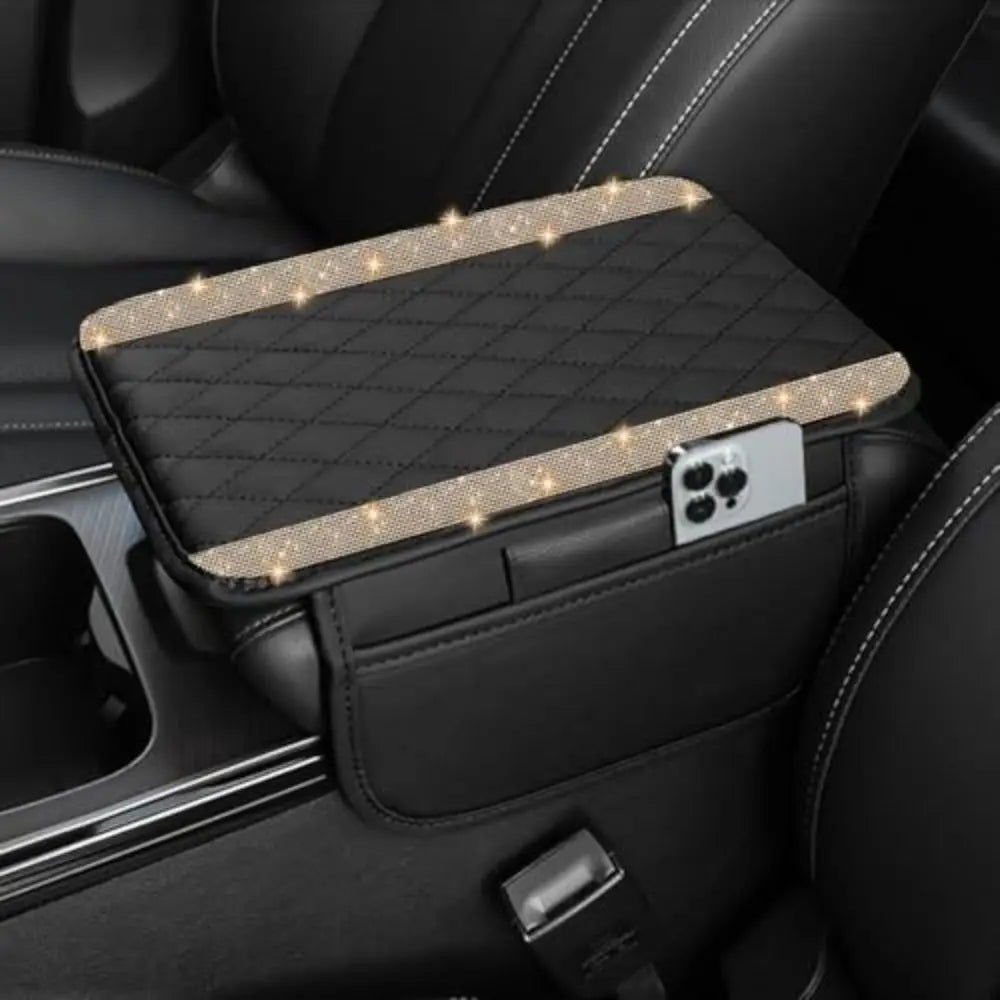 A black diamond quilted car armrest cover with storage featuring sparkling lights.