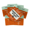 A stack of orange and green cards for a Truth or Dare game featuring prompts like Name That Word.