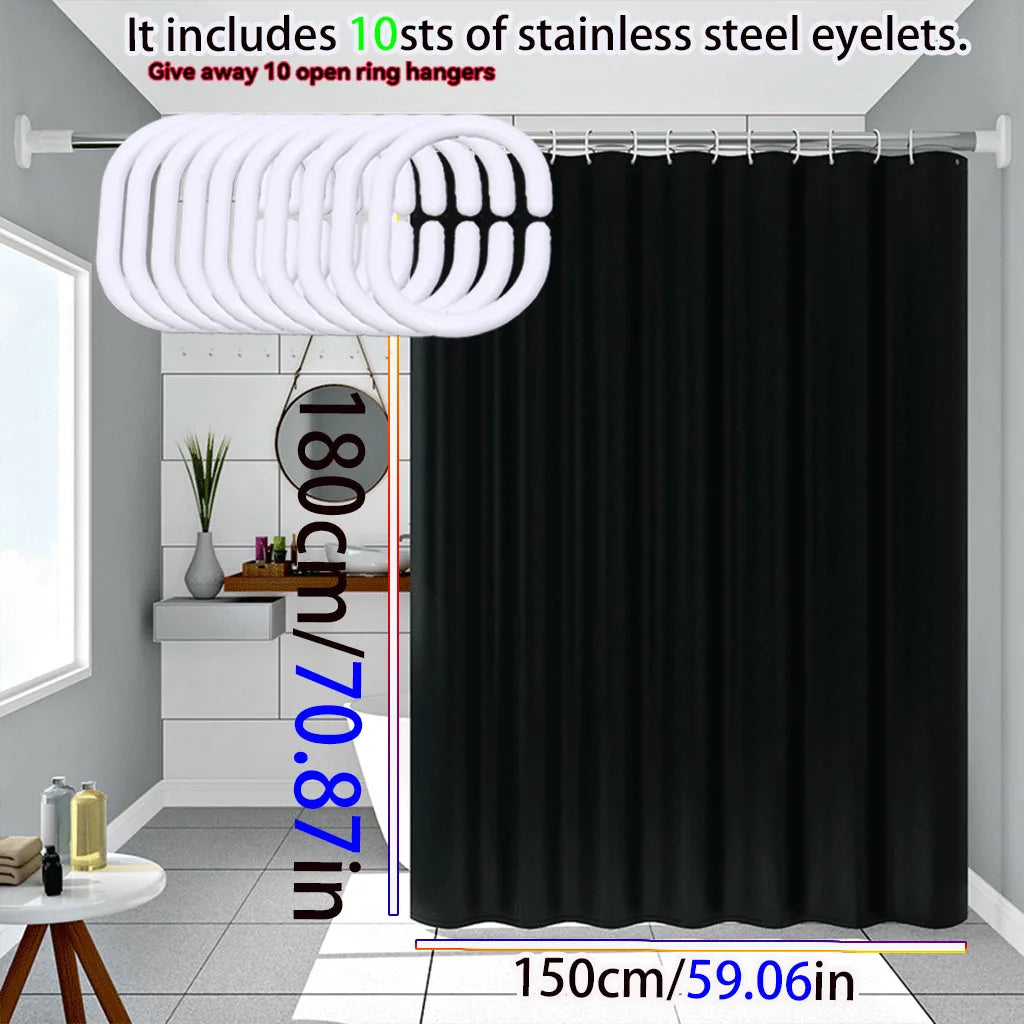 Solid black waterproof PEVA shower curtain hanging on a rod with stainless steel eyelets.