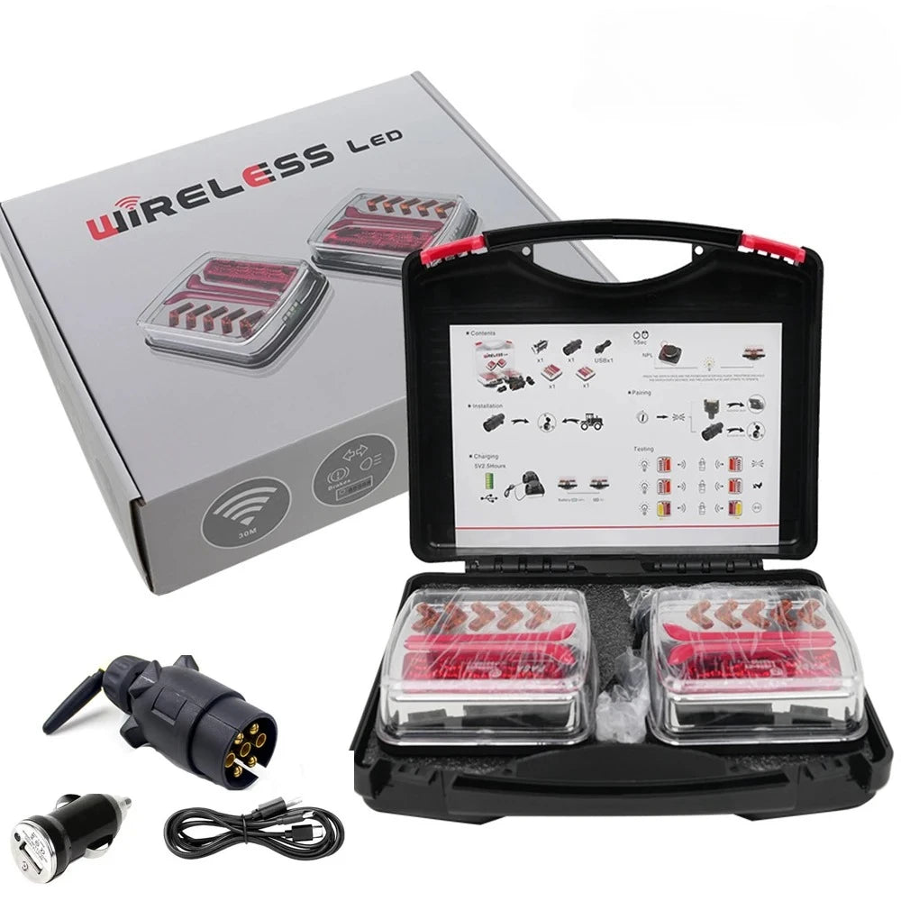 A box and a black magnetic wireless LED trailer light with rechargeable batteries and charging cable.