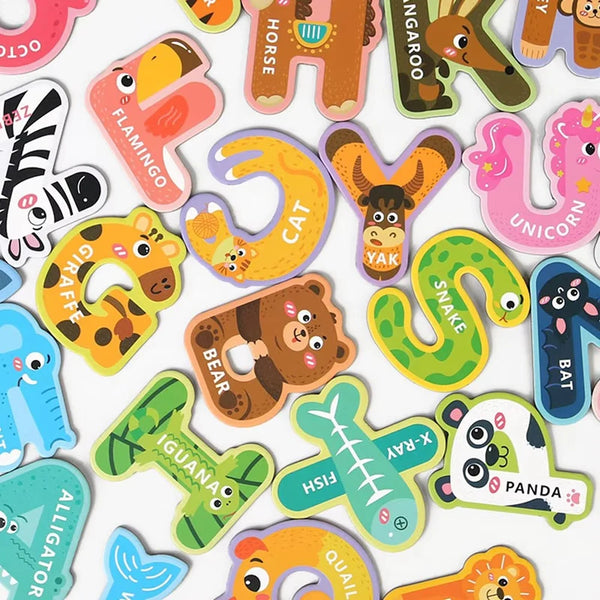 A collection of large magnetic alphabet and animal stickers featuring various colorful animals like a flamingo, cat, yak, bea