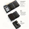 A black slim pop-up wallet shown with features like card slots and magnetic closure.