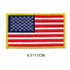 Embroidered American flag sew-on patch featuring the stars and stripes design on a yellow backing