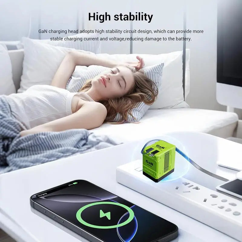 A person is sleeping while a green GaN charger and smartphone are displayed on a white surface.