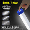 A hand holds a white LED magnetic light bar, demonstrating short click modes and long press explosive flash modes.