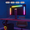 An RGBIC LED monitor backlight strip illuminates a computer monitor with various colored light bars.