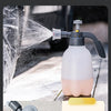 A hand pump foam sprayer is shown dispensing water automatically with one click.