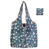 A light blue floral shopping tote bag with a pink trim and matching patterned pouch.