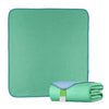 A teal reusable waterproof underpad and a rolled green towel for bed protection.