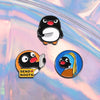 A set of three enamel pins featuring a cartoon penguin character with various expressions and accessories.