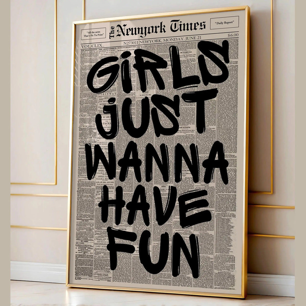 A framed print featuring a large black text quote from the New York Times newspaper style on a white background.