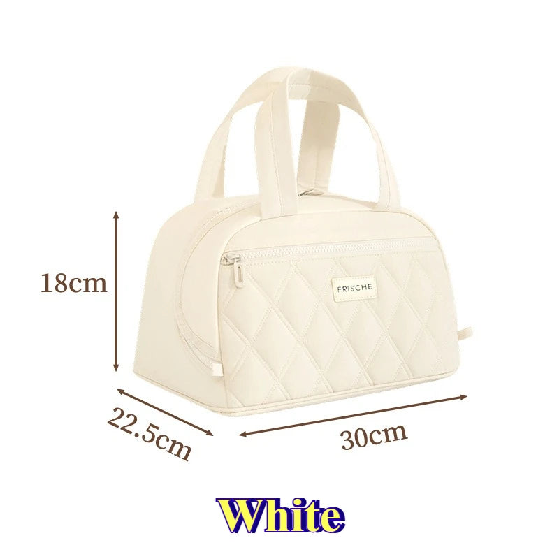 A white quilted PU leather insulated lunch tote bag shown from the top view.