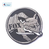Embroidered patch featuring a fox head design with hook and loop backing.