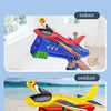A child is launching a yellow and blue foam plane toy in an outdoor setting.