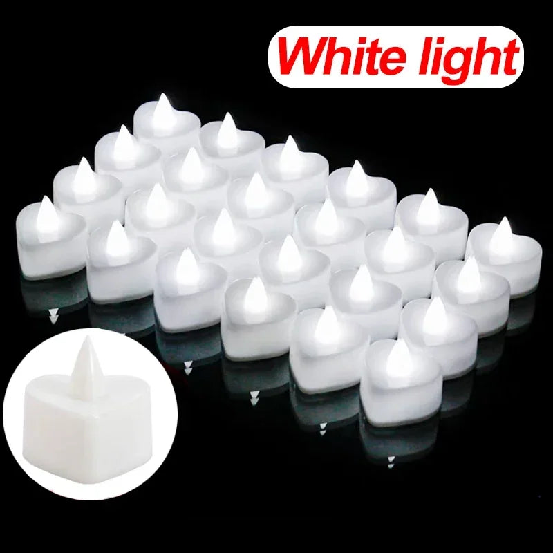 A collection of white heart-shaped flameless LED candles arranged on a dark surface.