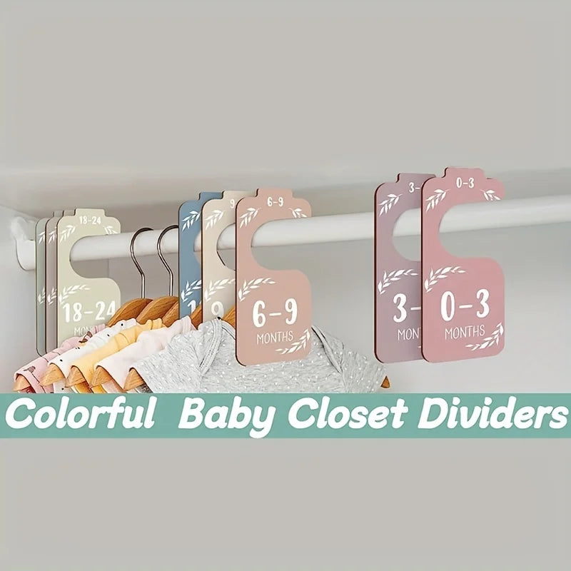 A set of colorful wooden baby closet dividers with age labels for organizing children's clothing.
