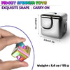 A hand holds a metallic fidget spinner toy with an exquisite shape and carry-on design.