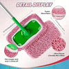 A green microfiber mop pad is shown being used on a pink, textured cleaning cloth for detail display.