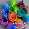 A collection of 6 dragon and egg sculptures in various colors, including green, blue, purple, and orange.