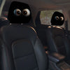 A pair of horror-themed car headrest covers featuring creepy face designs installed in a vehicle interior.