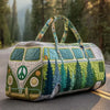 A quilted green and white travel duffle bag with olive green straps resting on an asphalt road.